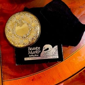 This is a sterling silver .925 Mirror For ur purse